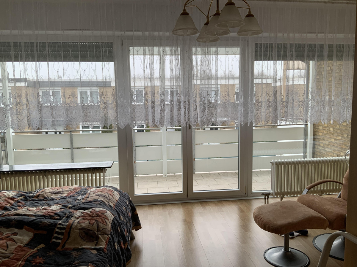 Schlafzimmer mit Balkon