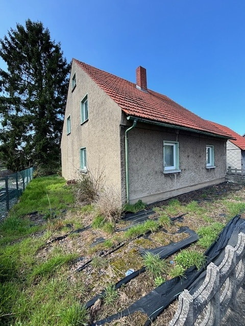 Grundstück mit Gebäude